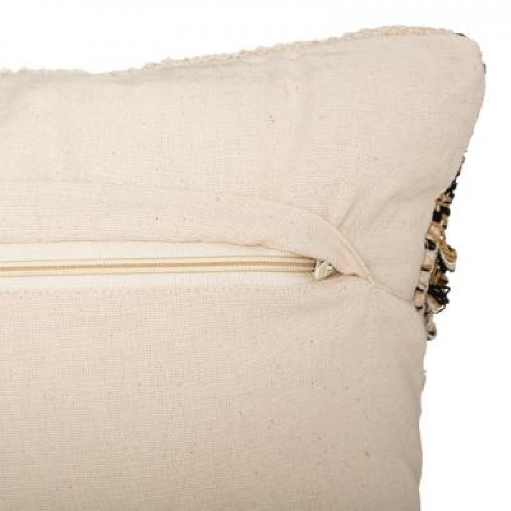 Coussin décoratif à motif en relief avec pompons