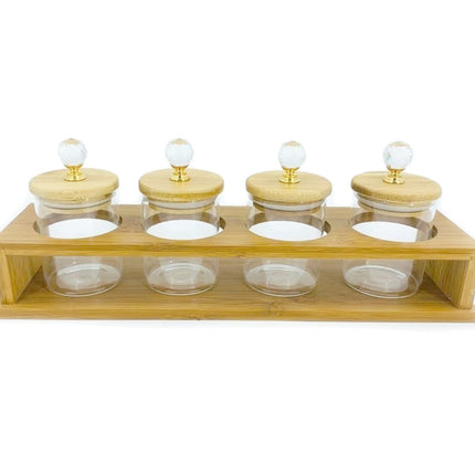 3 Glazen  voorraadpotten in een groot Bamboe frame