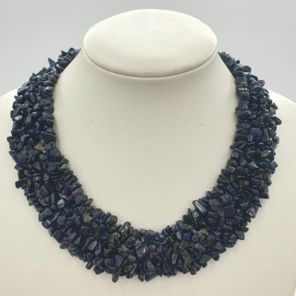 Large collier en pierre de cristal de roche bleu
