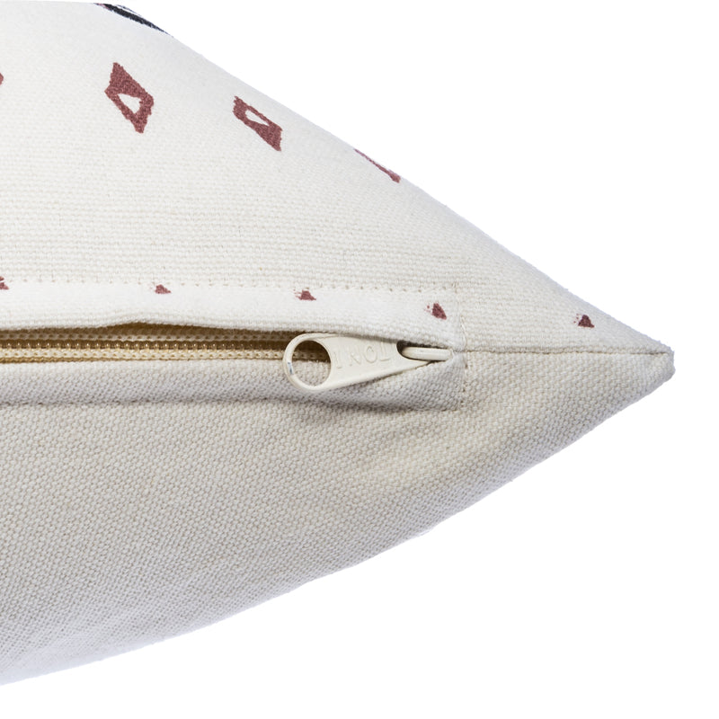 Decorative pillow with pom poms