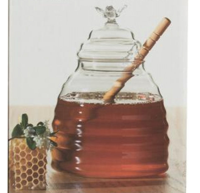 Glazen honing pot met houten lepel