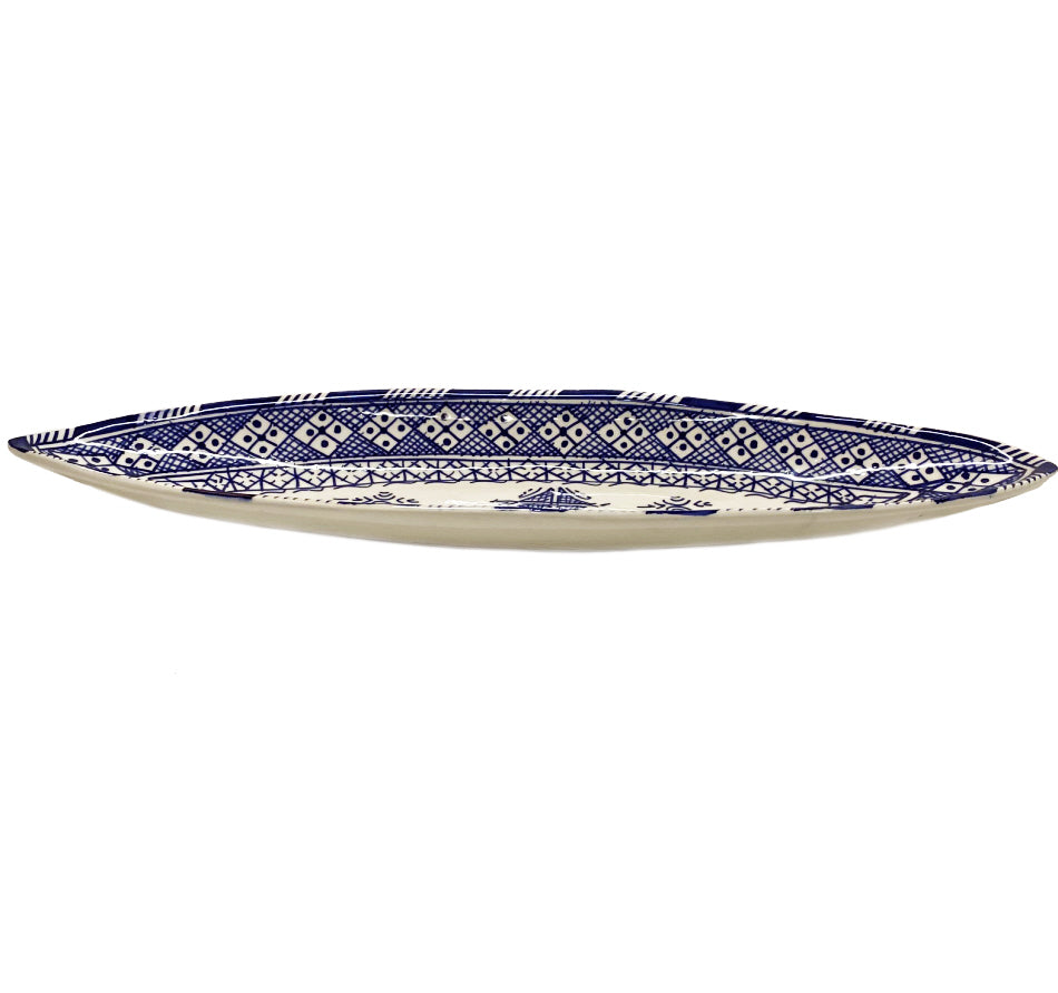 Plat en terre cuite canoë