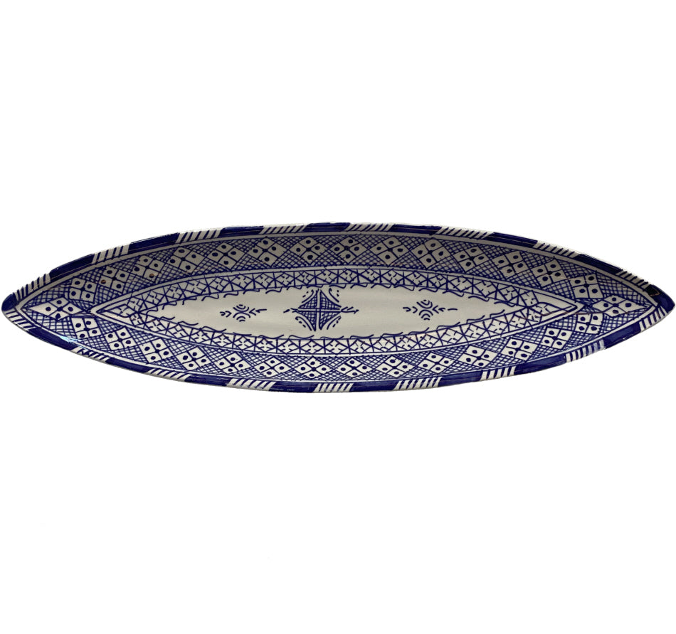 Plat en terre cuite canoë